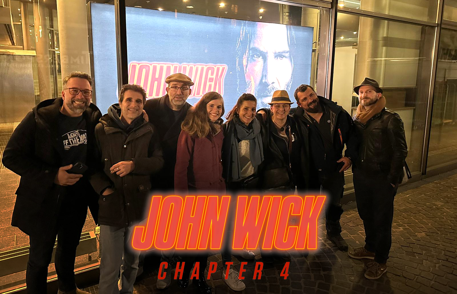 The Yard team attending FMX in Stuttgart in front of John Wick: Chapter 4 film poster, for which the studio provided VFX work