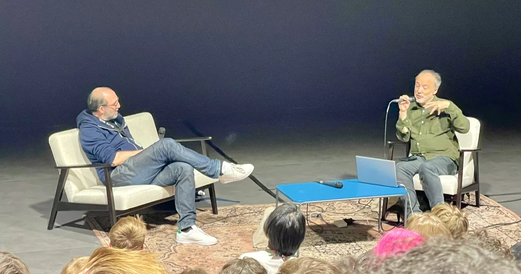 Harry Bardak, Head of VFX at The Yard, discusses with Tim Webber, Chief Creative Officer at Framestore, during a special keynote for the inauguration of ArtFX's new campus in Lille.